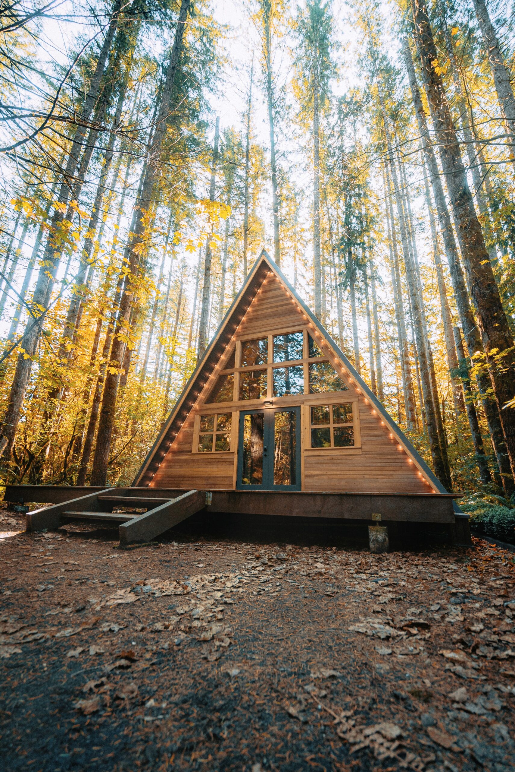 Warm A-frame tiny house in a forest